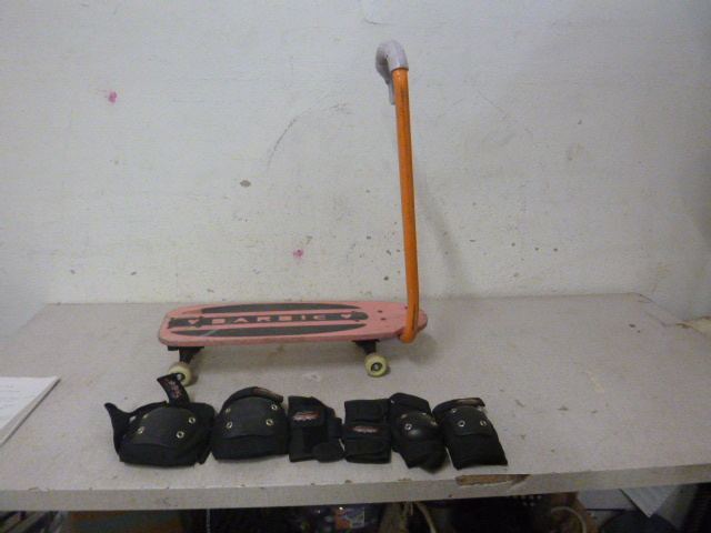 lot 53 image: Barbie Skate Board with Handle