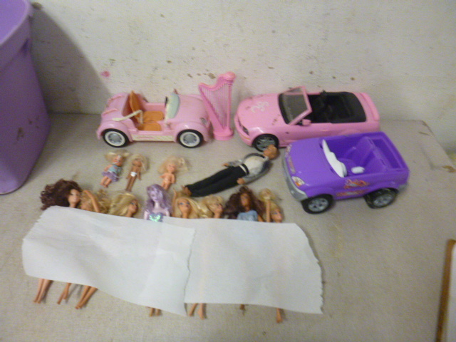 lot 62 image: Barbie Dolls and Barbie Cars