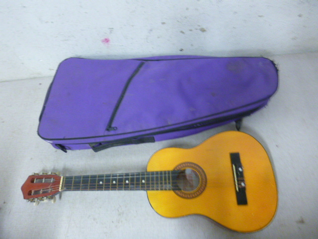 lot 63 image: Young Childs Play and Learn Guitar
