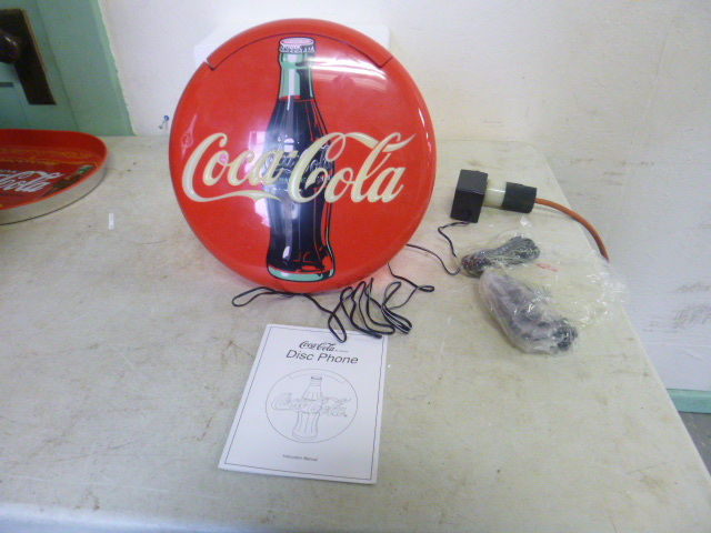 lot 127 image: Coca-Cola Disc Phone