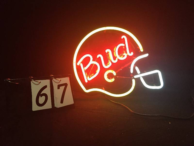 lot 67 image: Bud neon football helmet