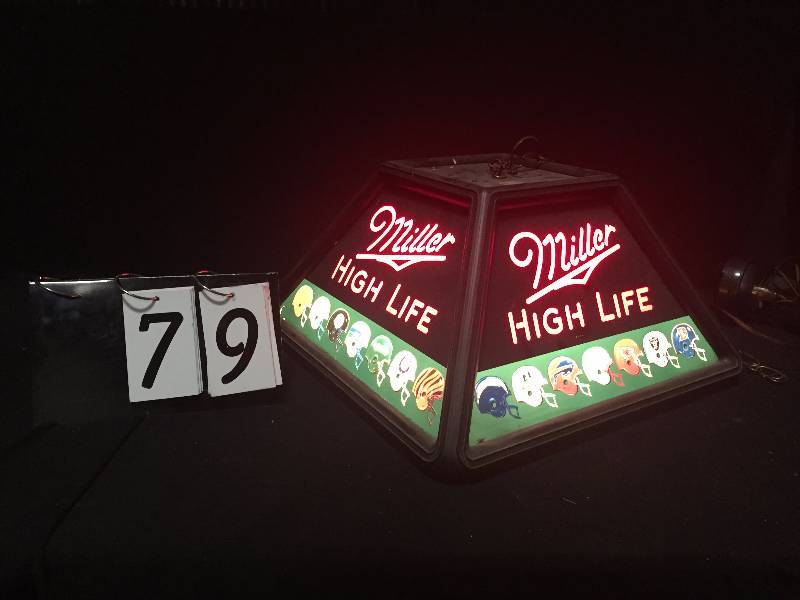 lot 79 image: Miller High Life NFL football helmets hanging lamp
