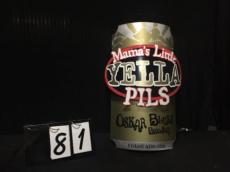 lot 81 image: Mamas Little Yella Pilsner curved tin sign