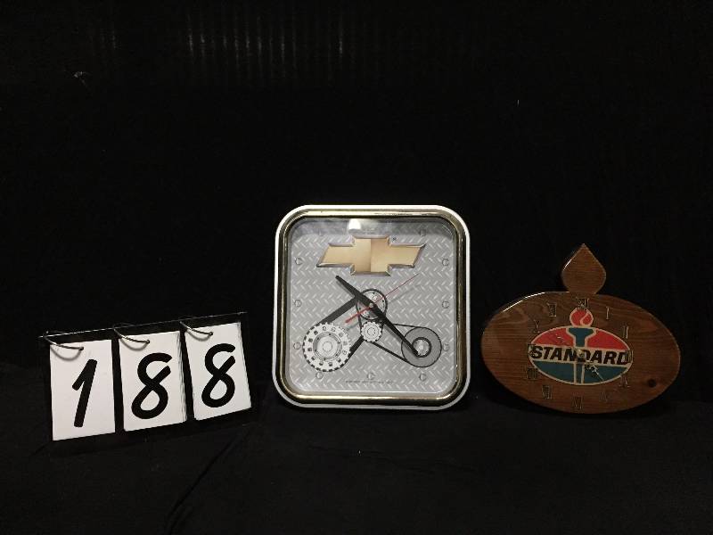 lot 188 image: Standard Oil logo clock and Genuine GM Chevy clock