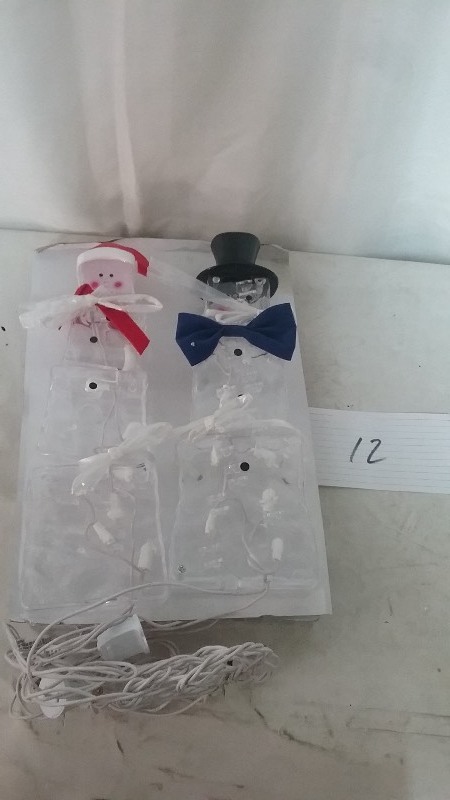 lot 12 image: Set of 4 Snowman LED Christmas Light