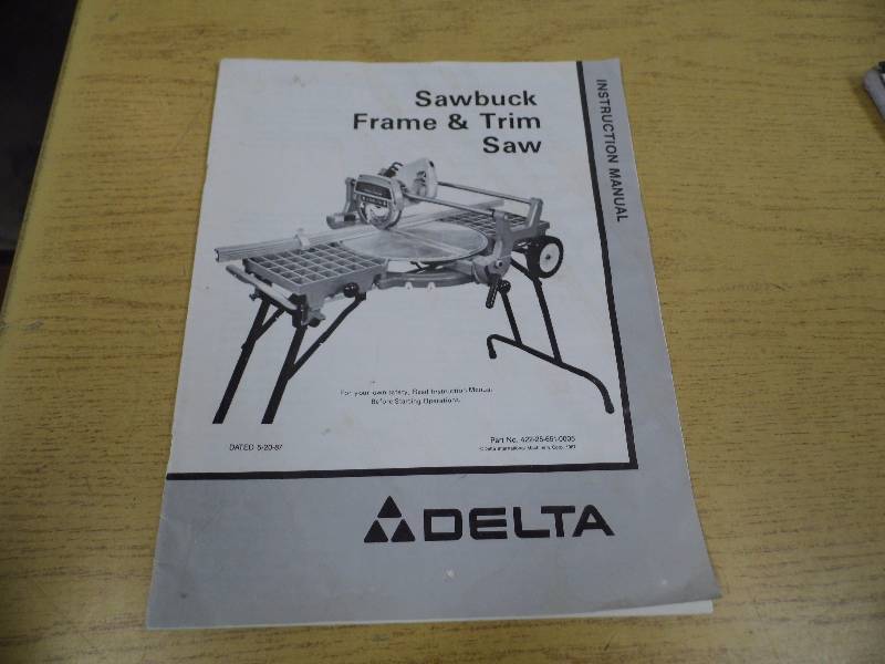 lot 15 image: Delta Sawbuck Frame & Trim Saw
