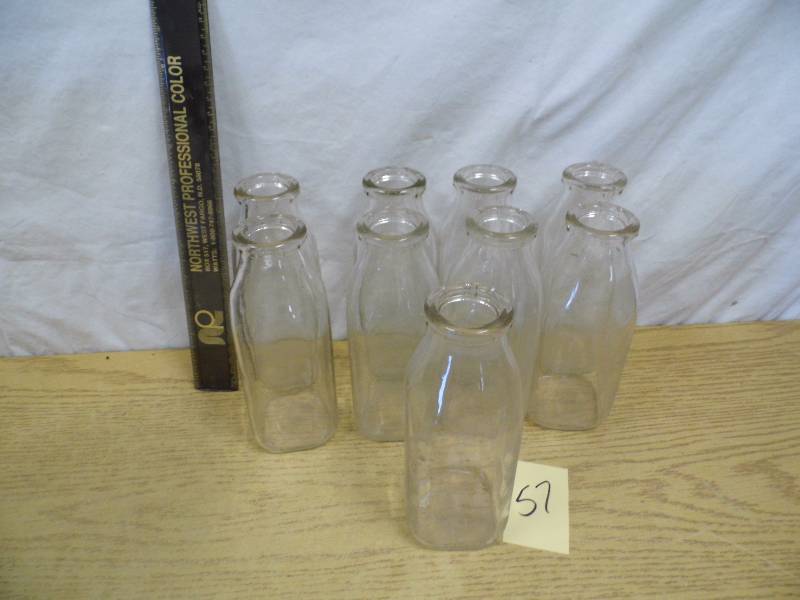 lot 57 image: Lot of 9 Milk  Cream Bottles