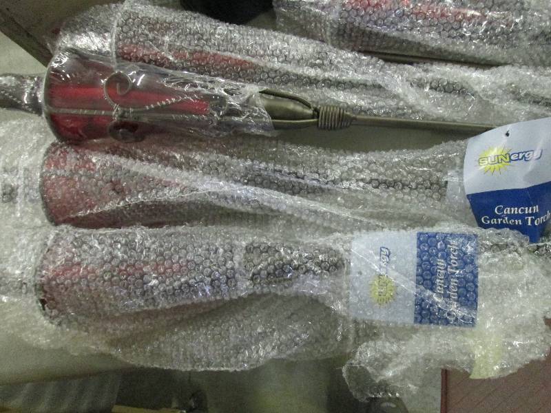 Box of Sunergy Garden Torches...