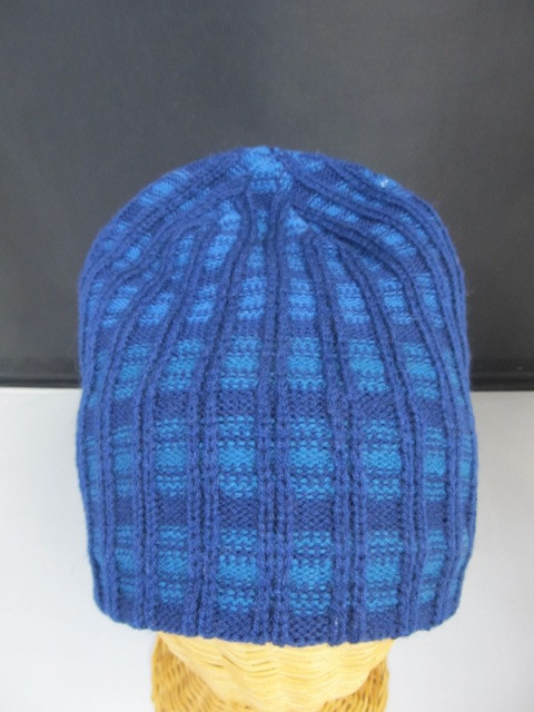 lot 76 image: Knit Winter Skull Cap, bright blue patterened