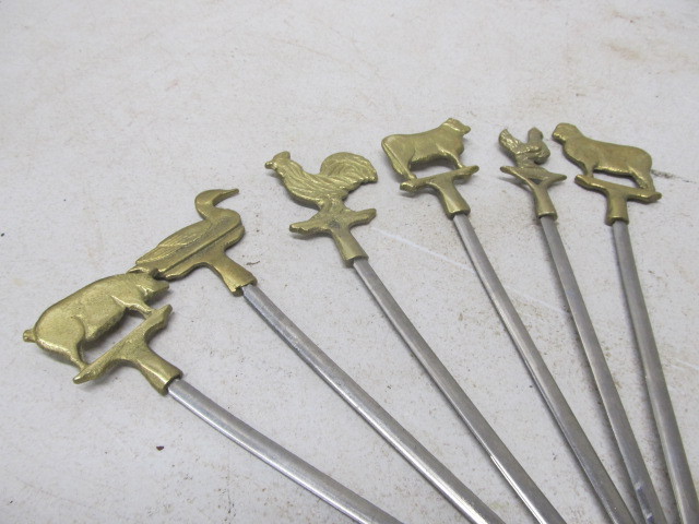 lot 288 image: Group of Vintage Figural Brass Skewers