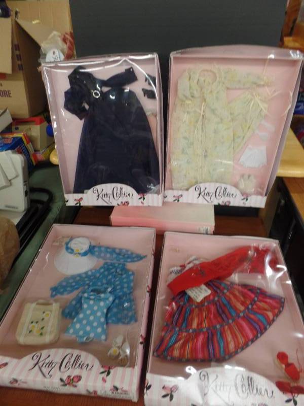 lot 583 image: KITTY COLLIER PACKAGED OUTFITS