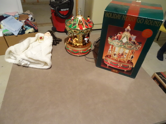 lot 126 image: Holiday Merry Go Round