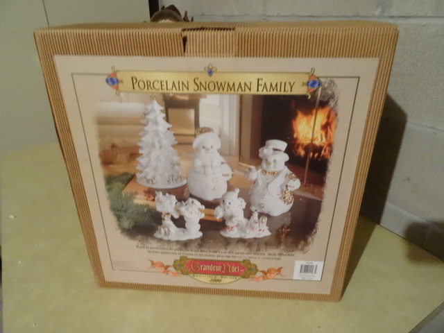 lot 145 image: Brand New In Box Porcelain Showman Family