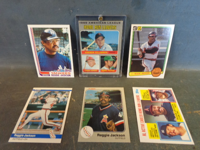 lot 13 image: Reggie Jackson Baseball cards with Killebrew