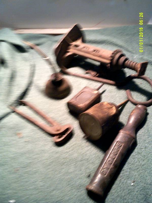 ANTIQUE OIL CANS AND TOOLS