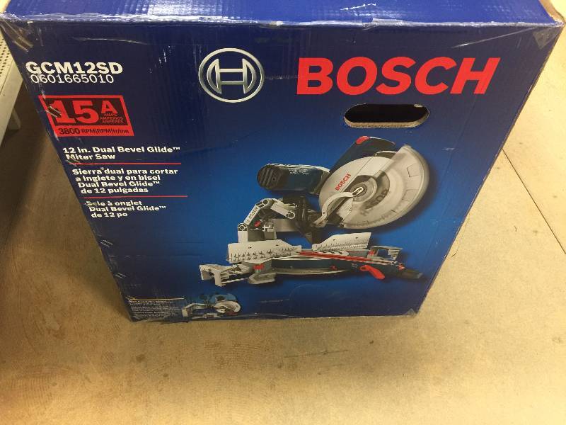 lot 136 image: Bosch 15 Amp Corded 12 in. Dual-Bevel Glide Miter Saw with 60-Tooth Blade open box never used