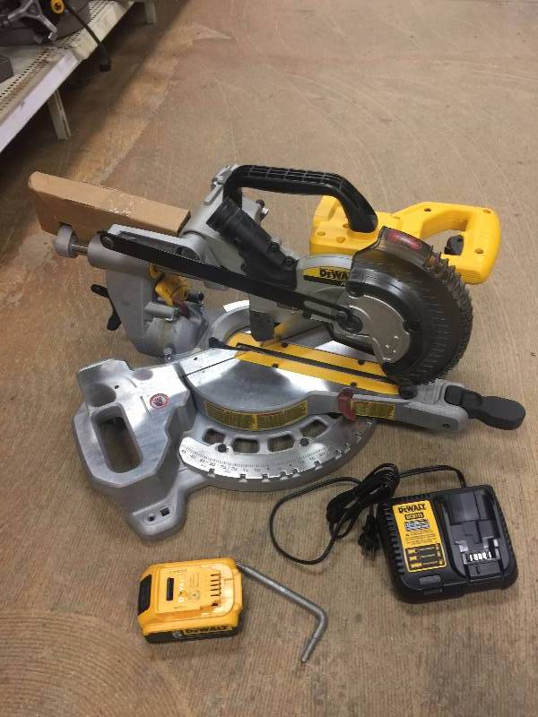 lot 137 image: DEWALT 20-Volt MAX Lithium-Ion Cordless 7-14 in. Miter Saw with Battery 4Ah and Charger in like new working conditions
