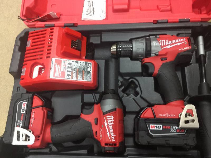 lot 141 image: Milwaukee M18 FUEL with ONE-KEY 18-Volt Lithium-Ion Brushless Cordless Hammer DrillImpact Driver Combo Kit in like New working conditions