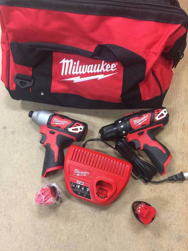 lot 142 image: Milwaukee M12 12-Volt Lithium-Ion Cordless Drill DriverImpact Driver Combo Kit (2-Tool) open box never used