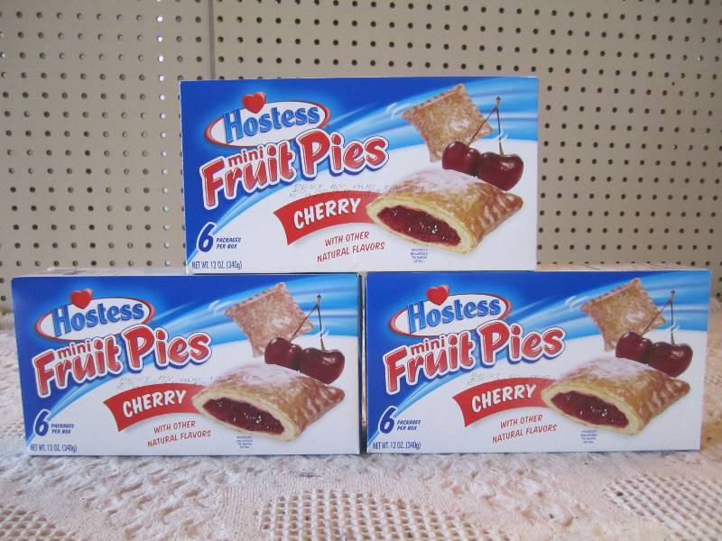 lot 118 image: 3 Boxes Hostess Mini Fruit Pies Che...