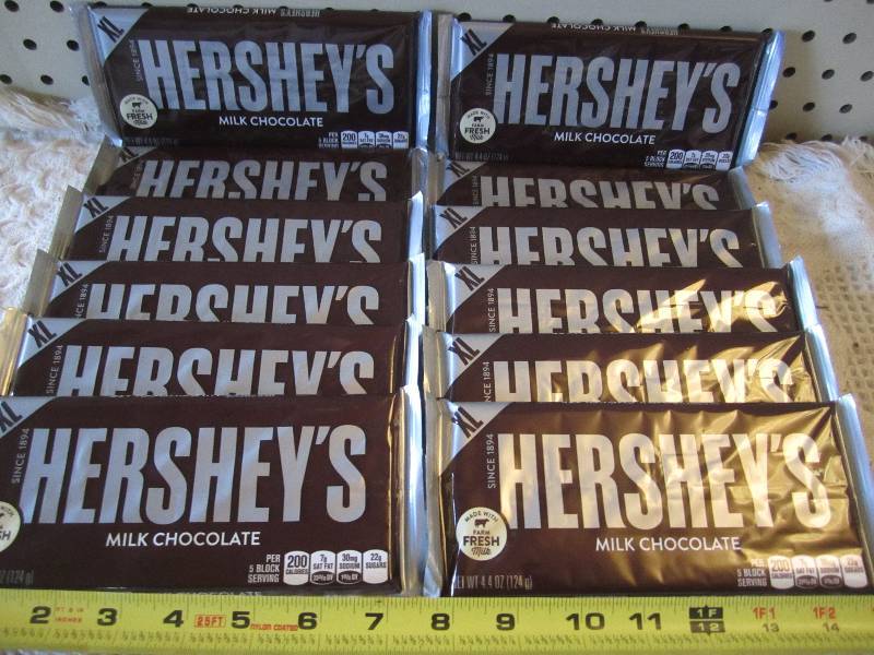 lot 128 image: Lot of 12 X-Large Hersheys Milk Cho...