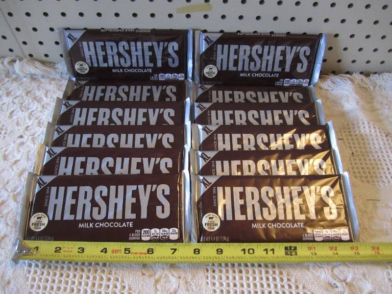 lot 130 image: Lot of 12 X-Large Hersheys Milk Cho...