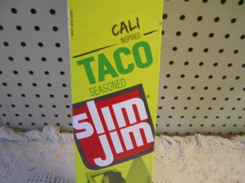 lot 151 image: Box of 24 Slim Jim Sticks Taco Seas...
