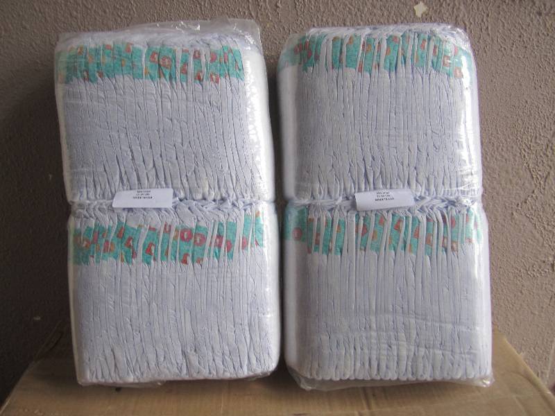lot 310 image: Lot of 100 Diapers Size Large 21-35...
