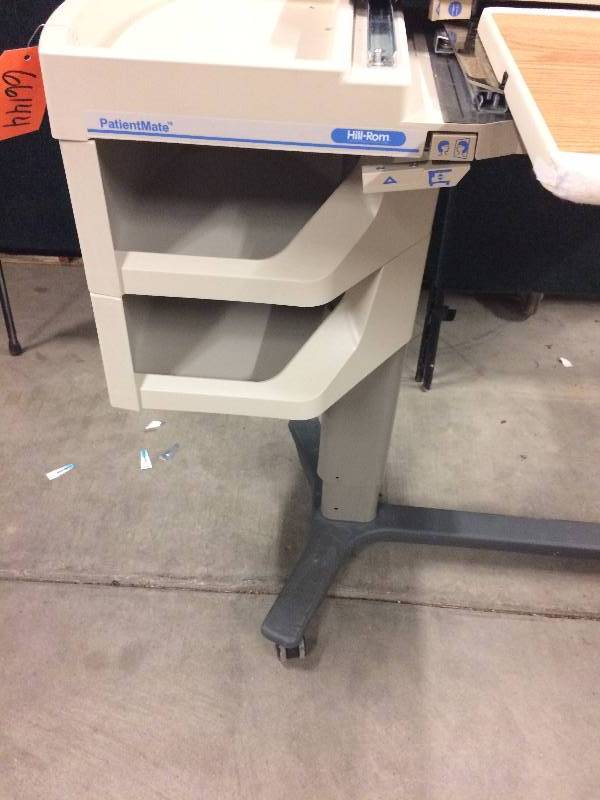 lot 1 image: Mobile Height Adjustible Great For Home Office Laptop Computer Use or Overbed Workstation Hill-Rom Patient Mate Wood Grain Tray Table With Mirror On Both Sides - Nice Condition