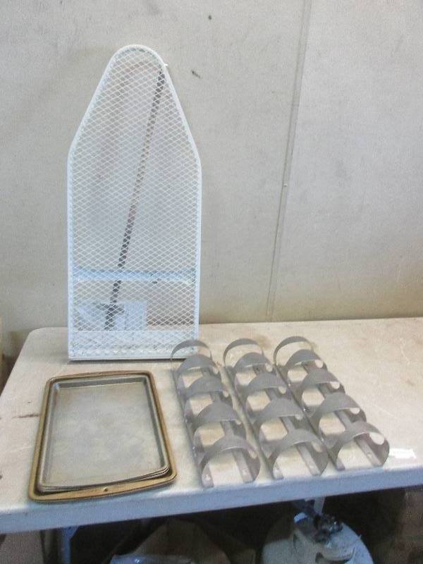 lot 35 image: Wine racks, cookie sheets and ironing board