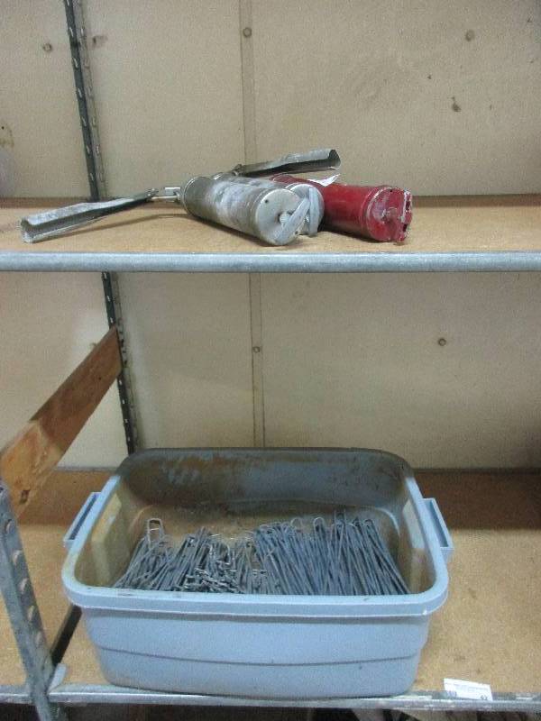 lot 42 image: Pegboard hooks and grease guns
