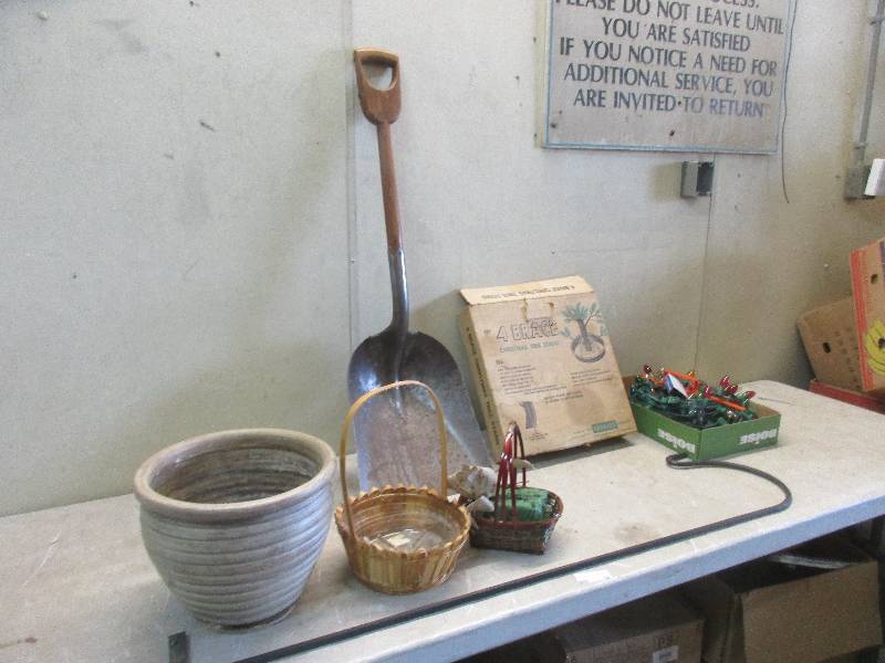 lot 68 image: Shepards hook, antique shovel, planters and tree stand and lights
