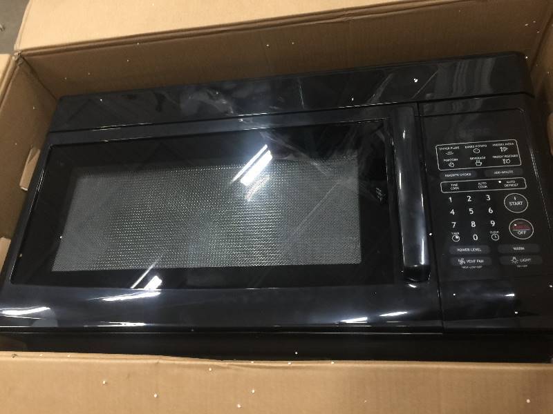 lot 87 image: 1.6 Cu. Ft. 1000 Watts Over the Range Microwave Oven in working conditions open box never used
