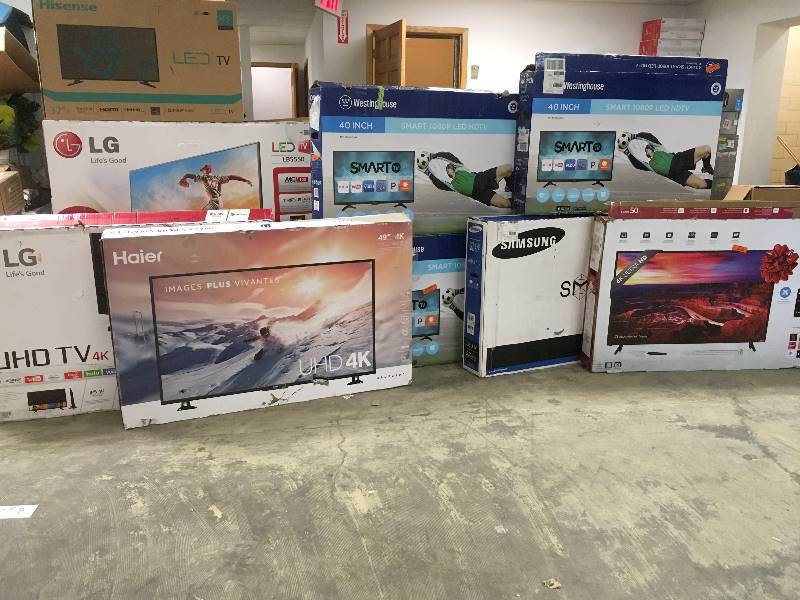 lot 102 image: Misc TVs for parts broken screen Smart Leds and more