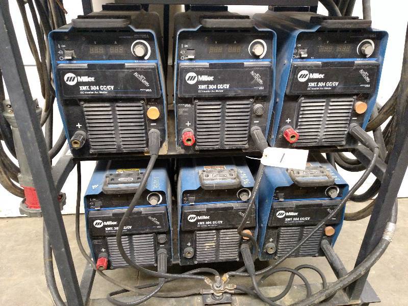 lot 1 image: Welder Bank Including (6) Miller XM...