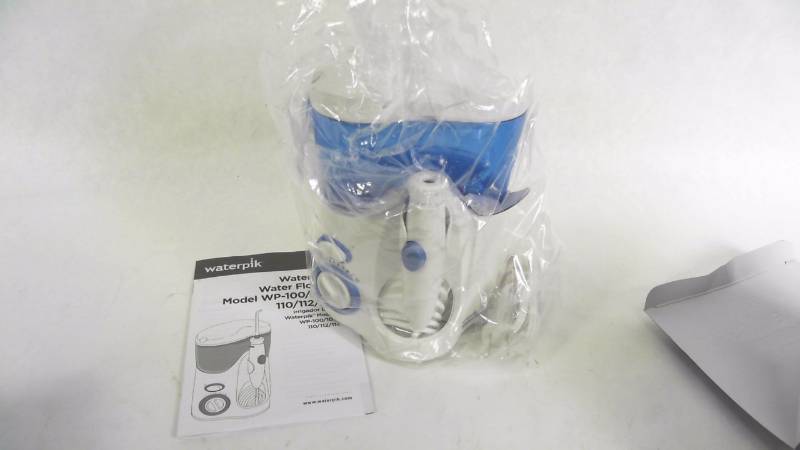 lot 2579 image: Waterpik - Ultra Water Flosser - White