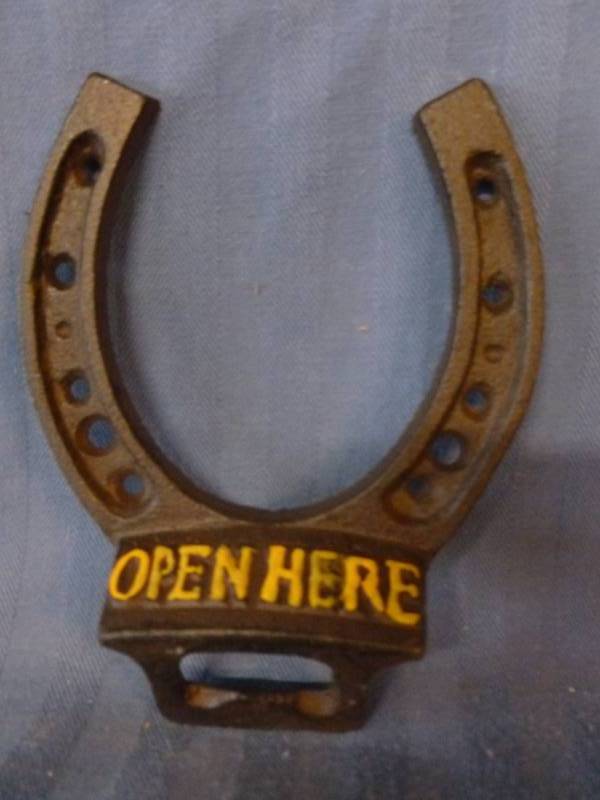 lot 201 image: Cast Iron Bottle Opener
