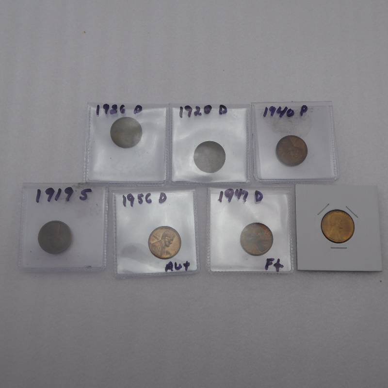 lot 100 image: Lot of Seven Graded Lincoln Cents