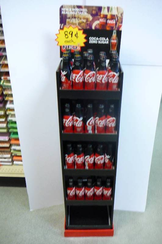 lot 38 image: Display rack of Coca Cola