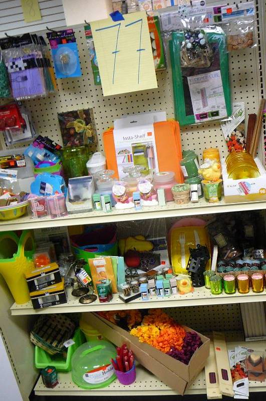 lot 77 image: Flowers, Baskets. Taper candles. Votive candles. Misc. Lots of candles and home decor