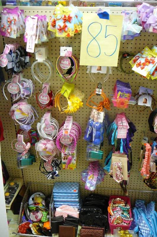 lot 85 image: Hair Products For Women And Kids Includes Wire Basket, Headbands ( 50 Plus ), Curlers, Temporary Hair Color, Coin Purses ( 20 Plus )