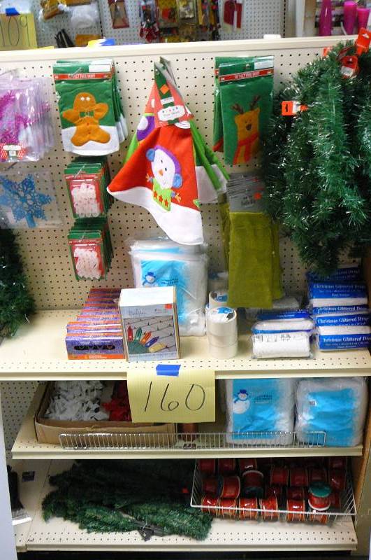 lot 160 image: Xmas Decor, Tree skirts, Red Ribbon, Mini artificial Tree and flowers