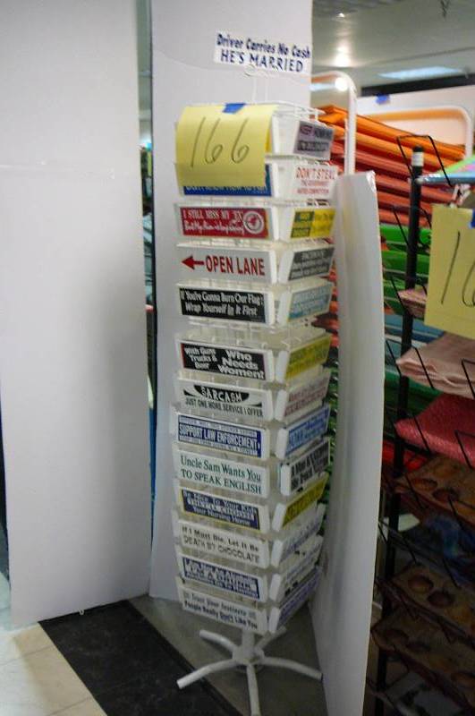 lot 166 image: Bumper stickers with rack, 80 stickers