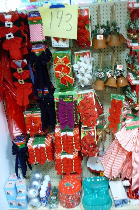 lot 193 image: Christmas Bows, tins, Platters, Bells, Snow bulbs, tinsel hats