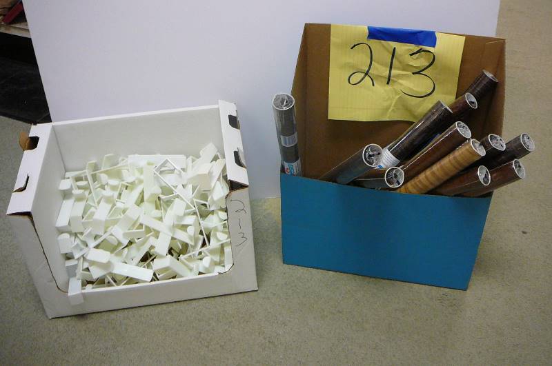 lot 213 image: Adhesive drawer liner, Plastic over the door hooks