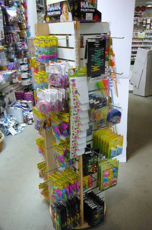 lot 243 image: Party Favors, Bracelets etc, Rack Included