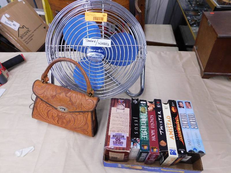 lot 107 image: FAN, VCR TAPE MOVIES, LEATHER HAND BAG