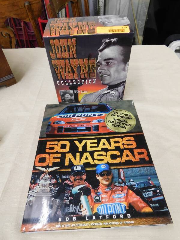 lot 110 image: JOHN WAYNE VCR MOVIE SET, 50 YEARS OF NASCAR BOOK