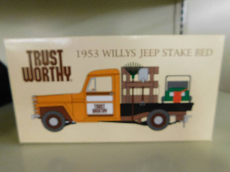 lot 48 image: 1953 WILLYS JEEP STAKE BED DIE CAST COLLECTABLE BANK, TRUST WORTHY
