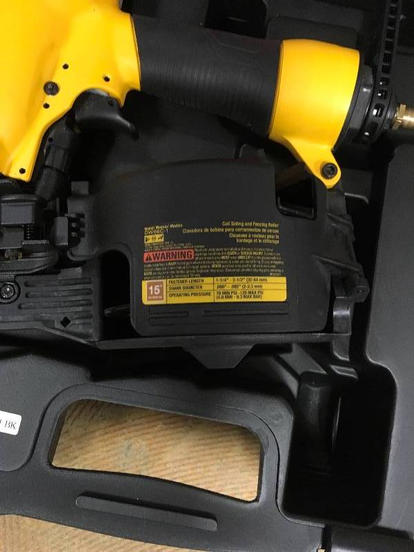 lot 22 image: DeWalt DW66C-1 Pneumatic 15-Degree Coil Siding Nailer in working conditions